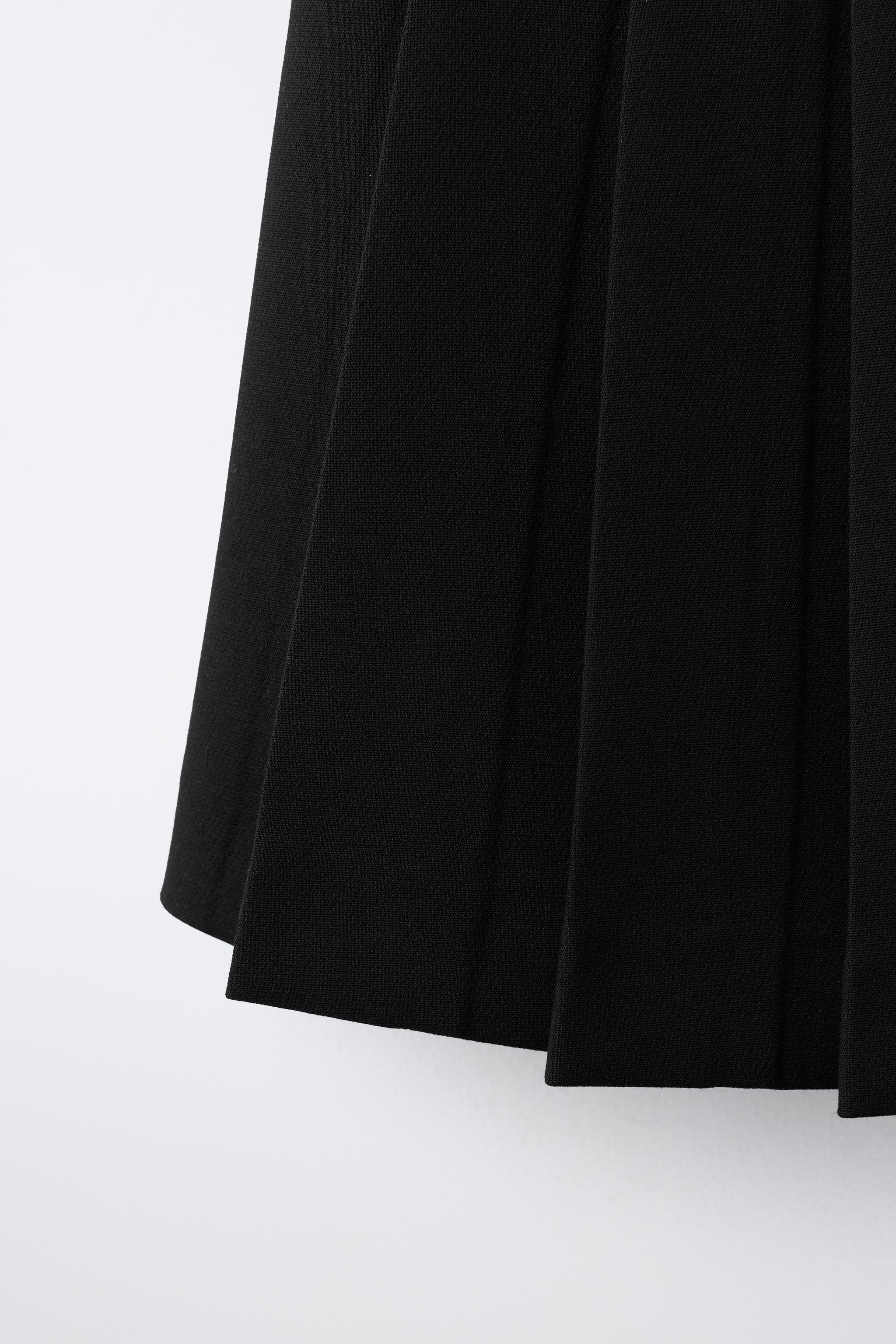 BUTTONED PLEATED SKIRT